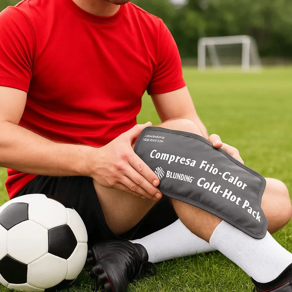 Compresa de gel frío-calor Blunding aplicada en rodilla tras lesión deportiva, ideal para golpes y esguinces.