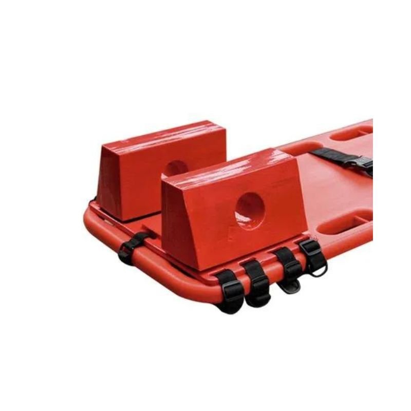 Inmovilizador Lateral de Cabeza Adulto instalado en una tabla espinal